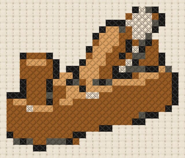 Wood plane finished in cross stitch on Aida cloth