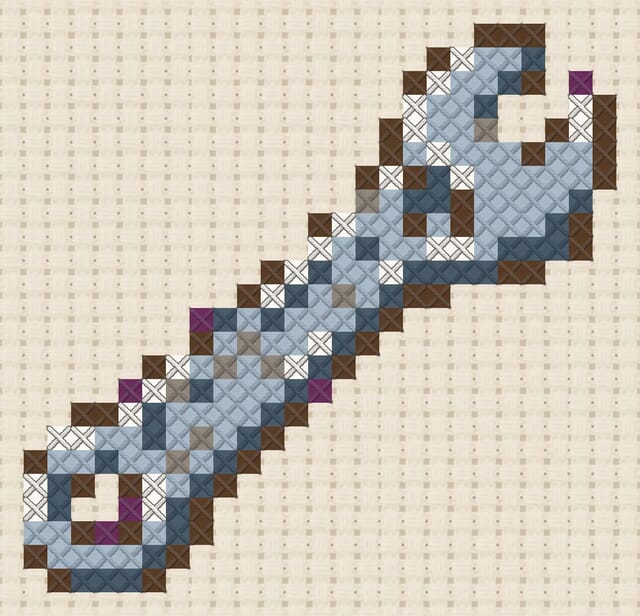 Wrench finished in cross stitch on Aida cloth