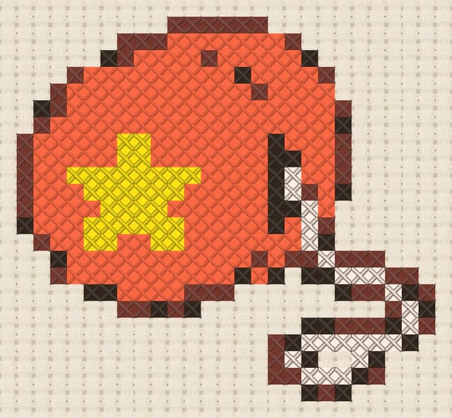 Yo-yo finished in cross stitch on Aida cloth